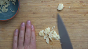 cut garlic into slices