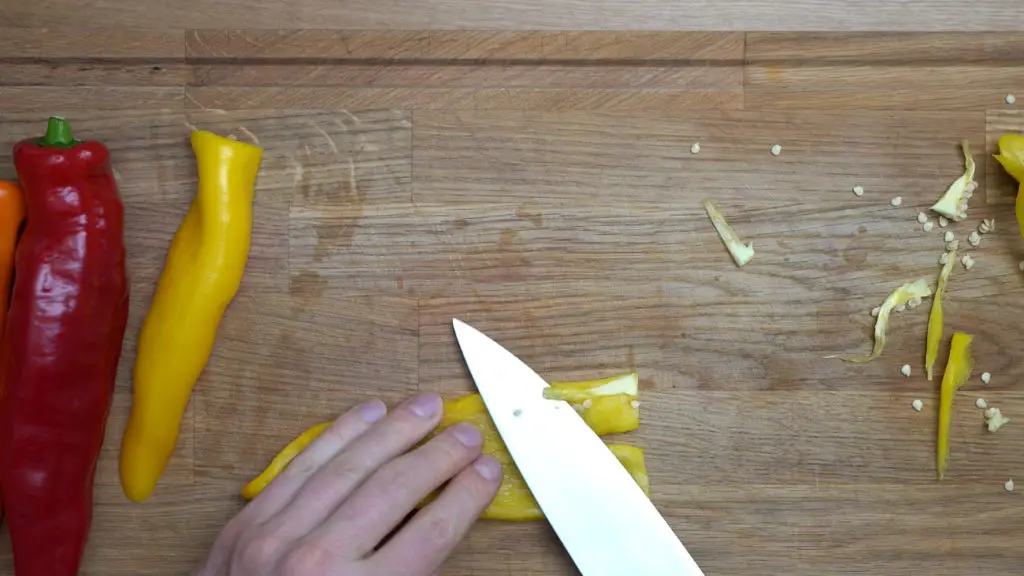 cutting and deseeding peppers