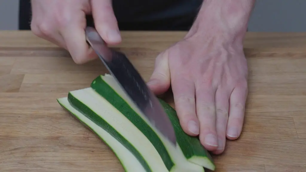 cutting zucchini in stripes