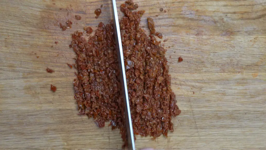 finely chop dried tomatoes