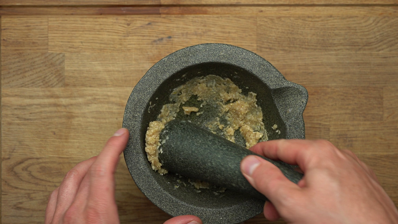 grinding pine nuts